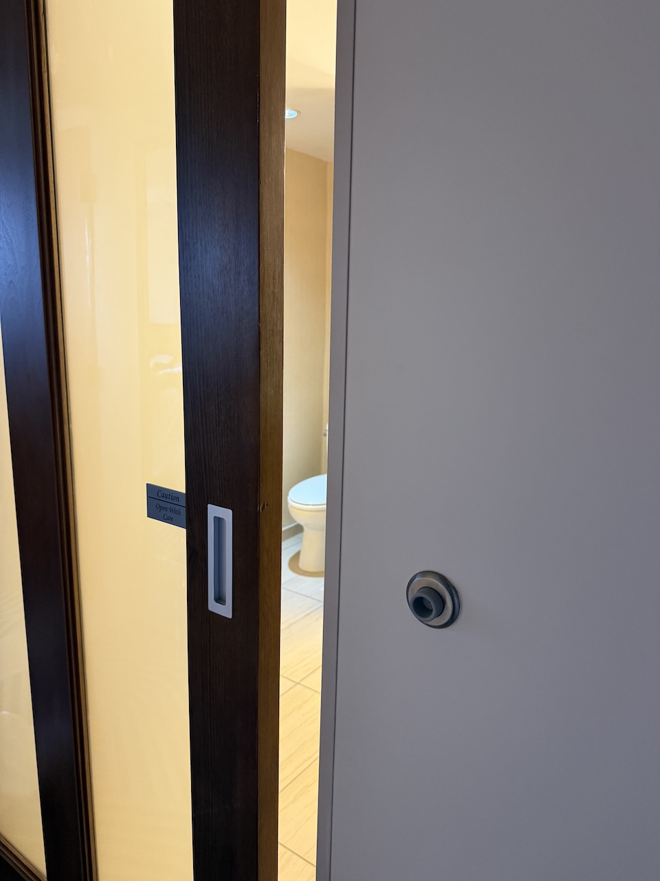 hotel bathroom barn door gap from door