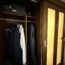 hotel bathroom barn door with closet open