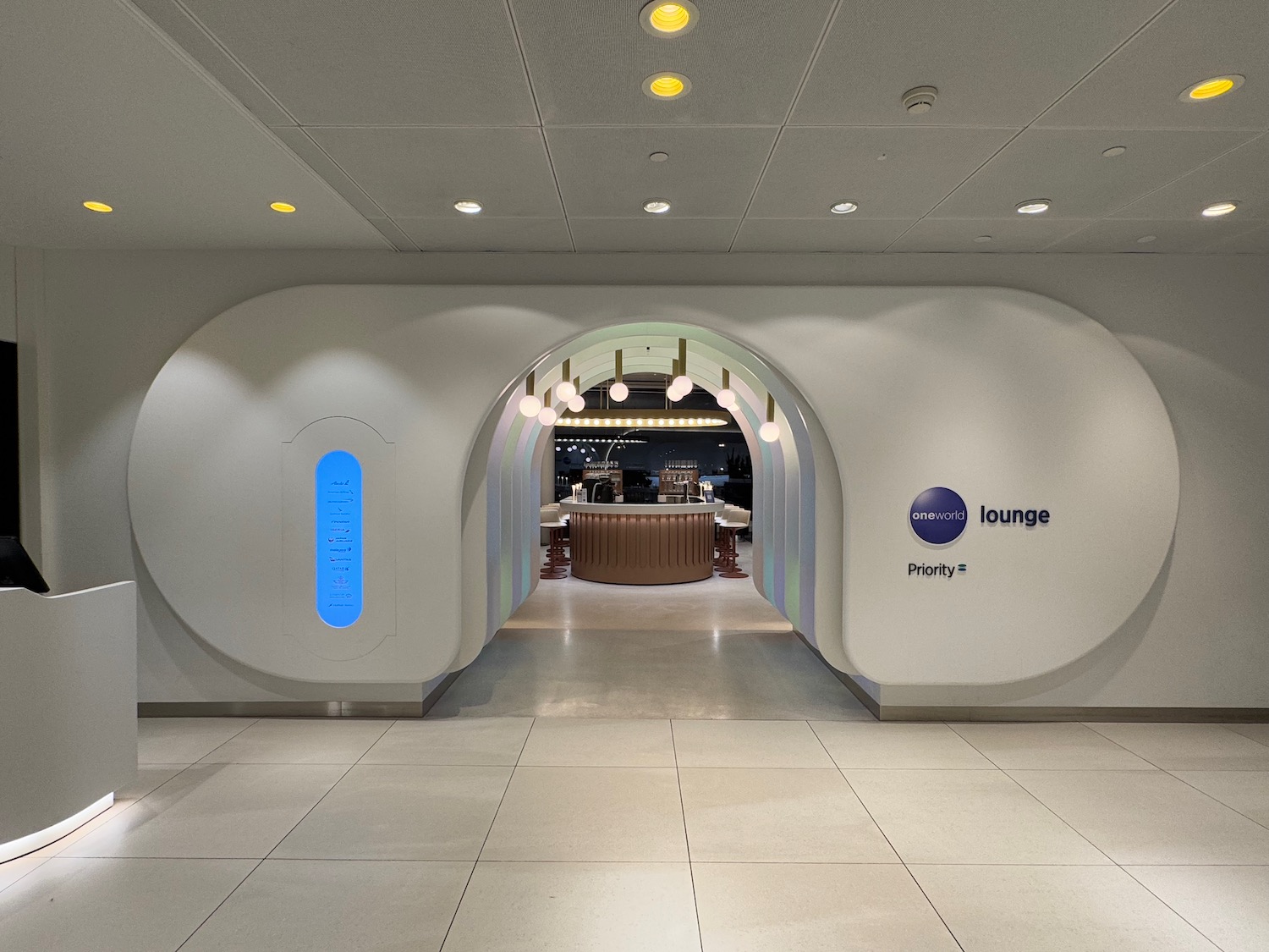a white room with a round doorway and a counter