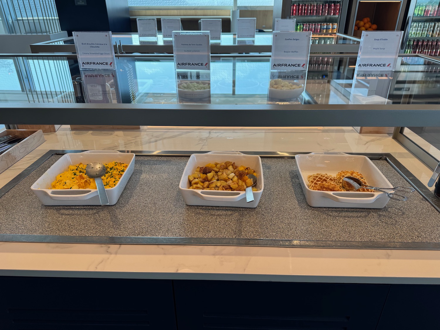 a row of bowls of food