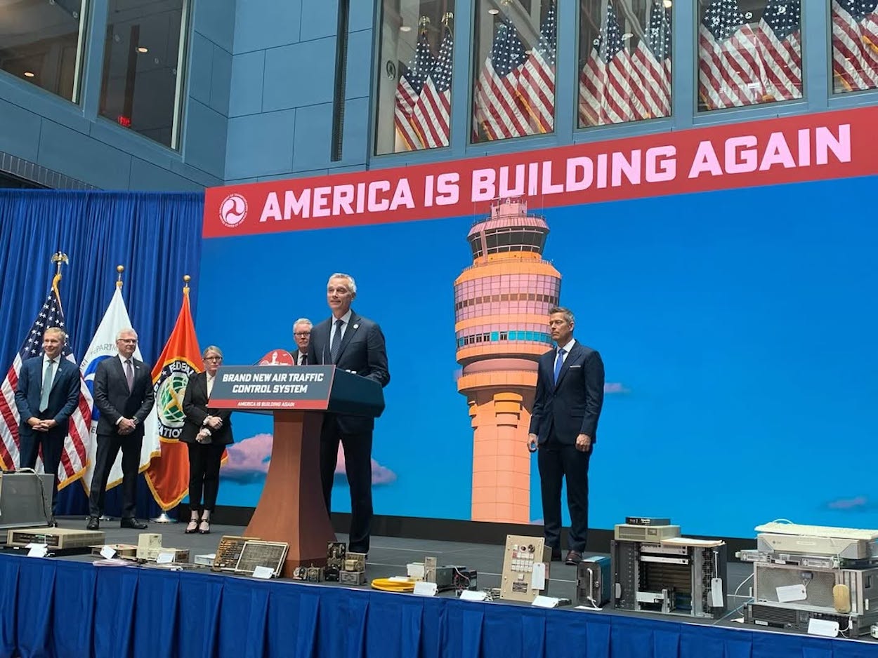 a group of men standing on a stage