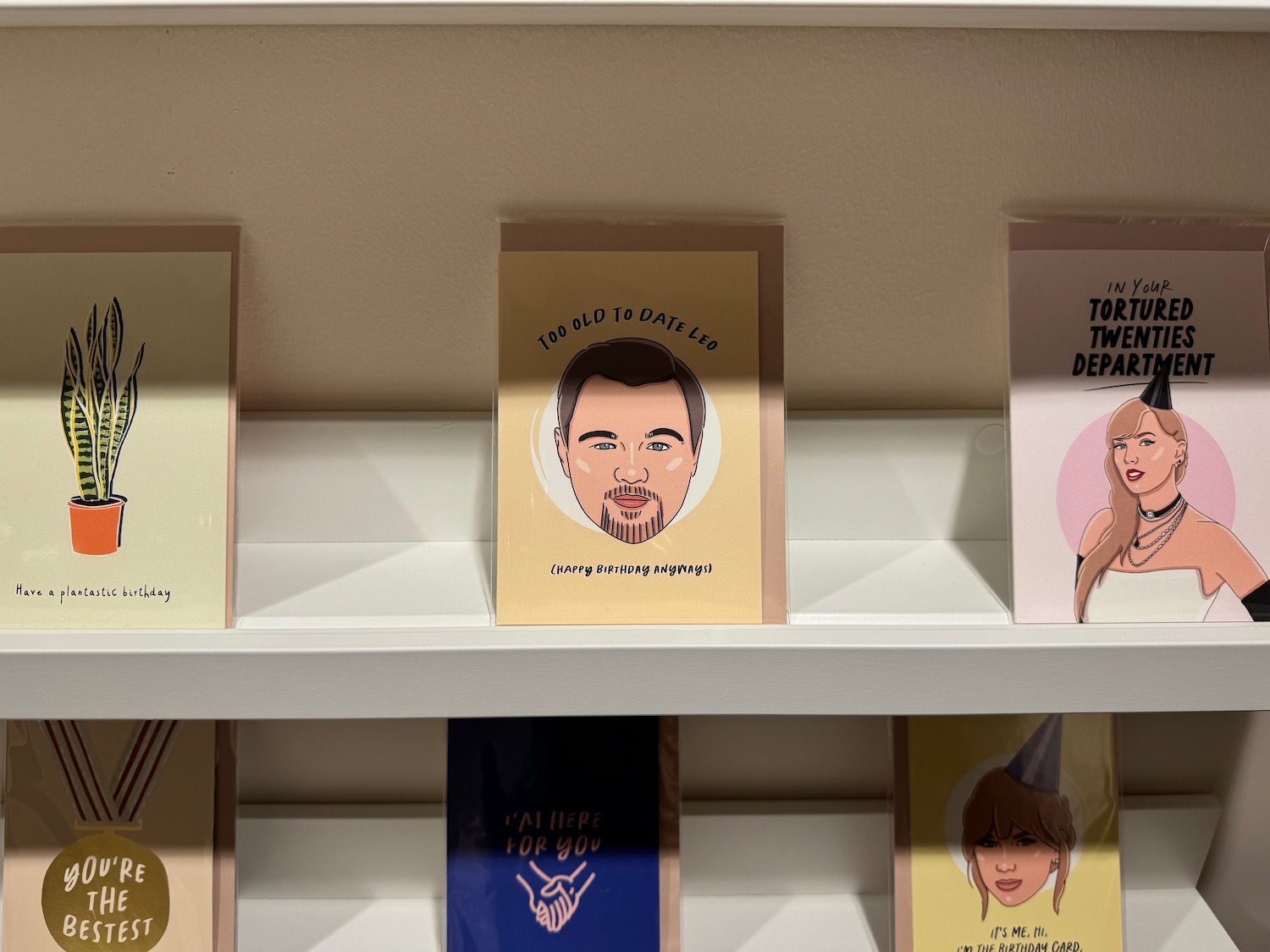 a shelf with cards on it