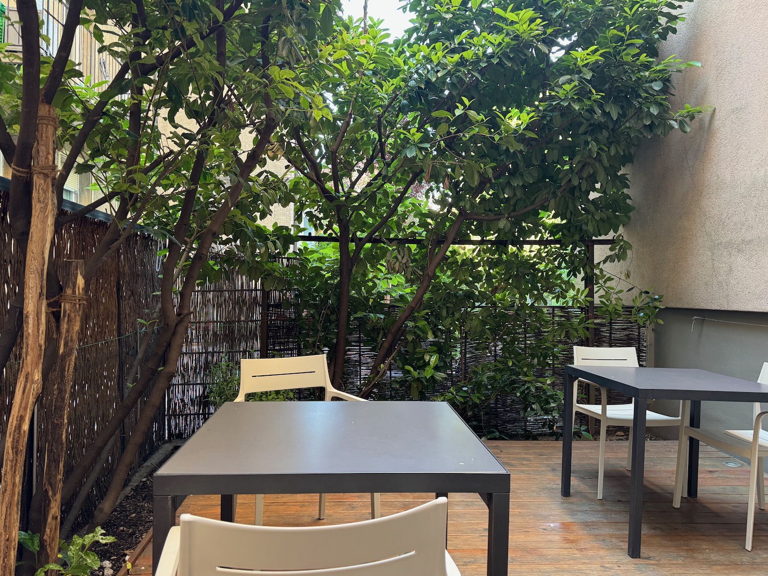 a table and chairs on a deck