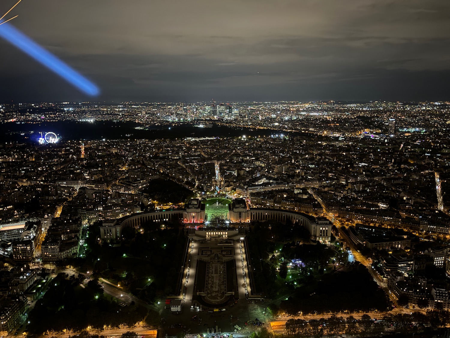 a city with a beam of light
