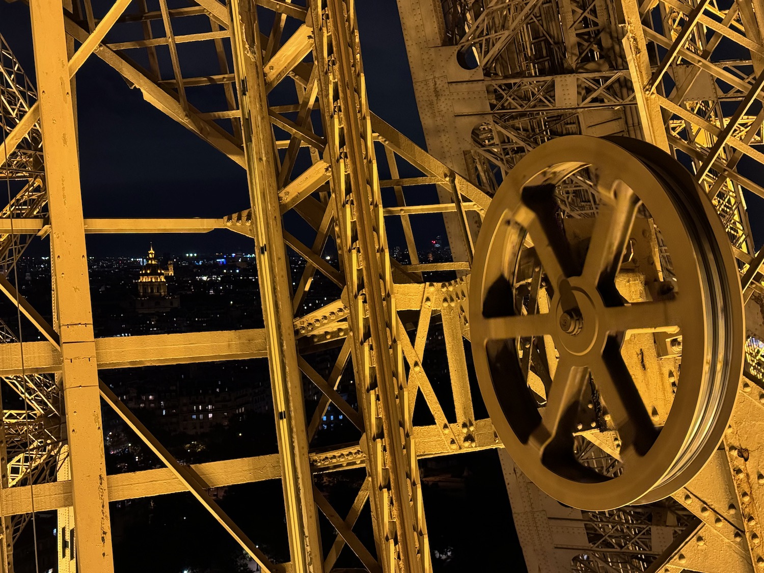 a large metal structure with wheels