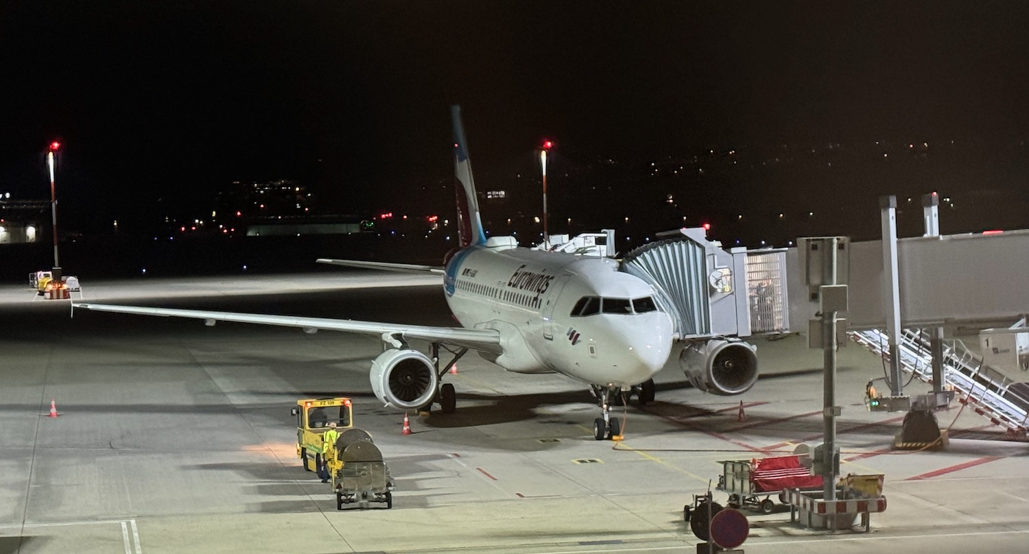 an airplane on the runway at night
