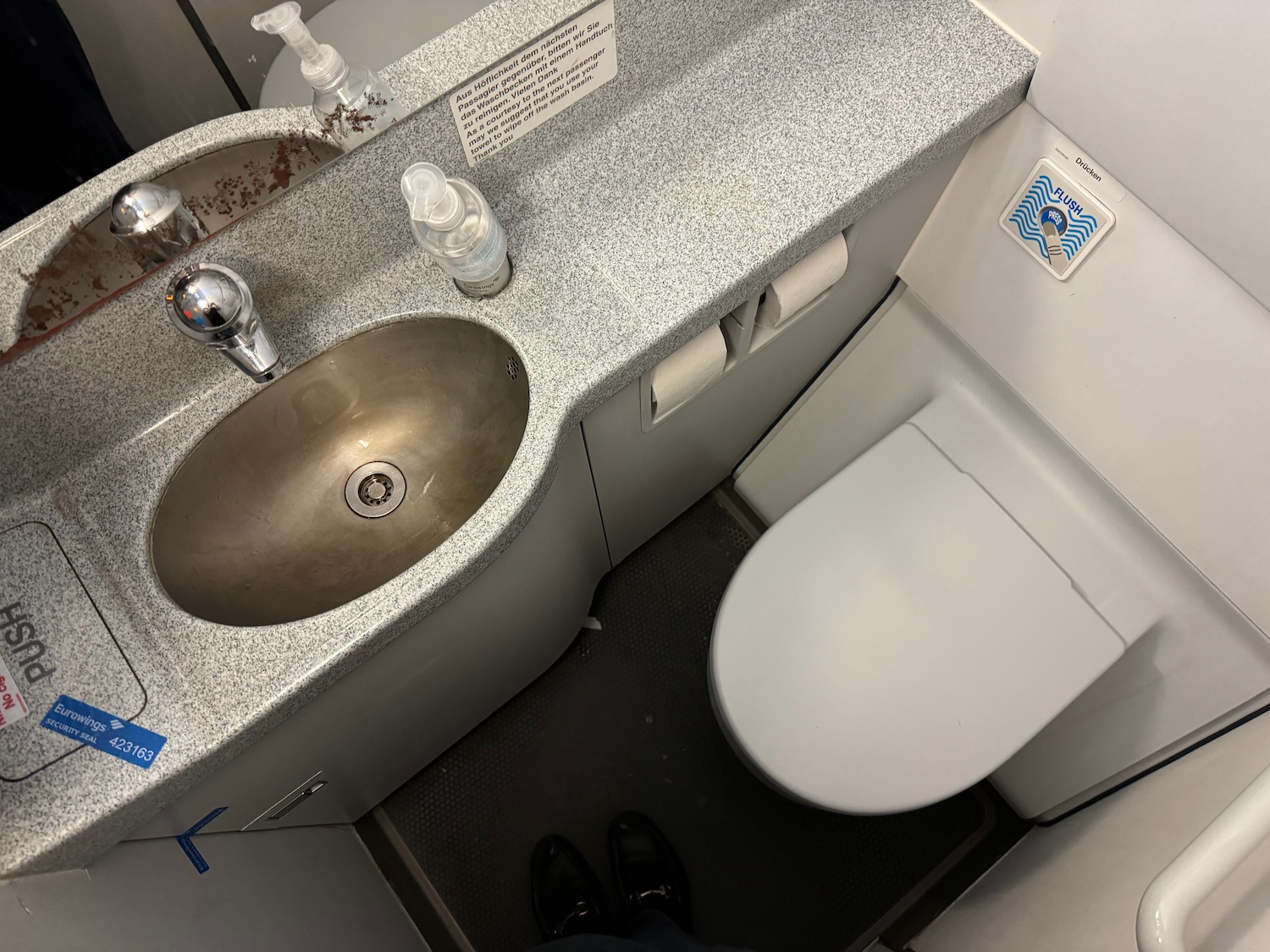 a sink and toilet in a bathroom