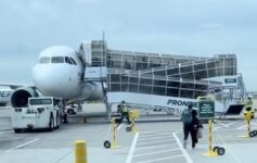 a plane with passengers boarding