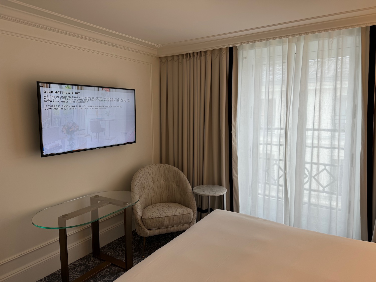 a room with a television and a chair