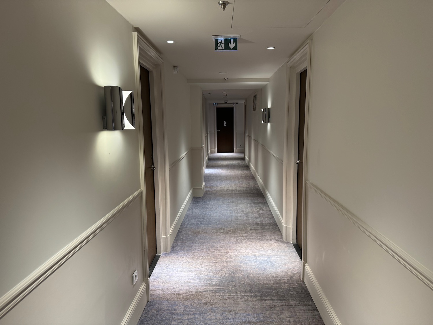 a hallway with a light on the ceiling