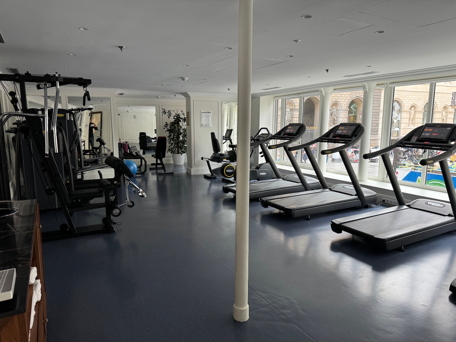 a gym with treadmills and exercise equipment