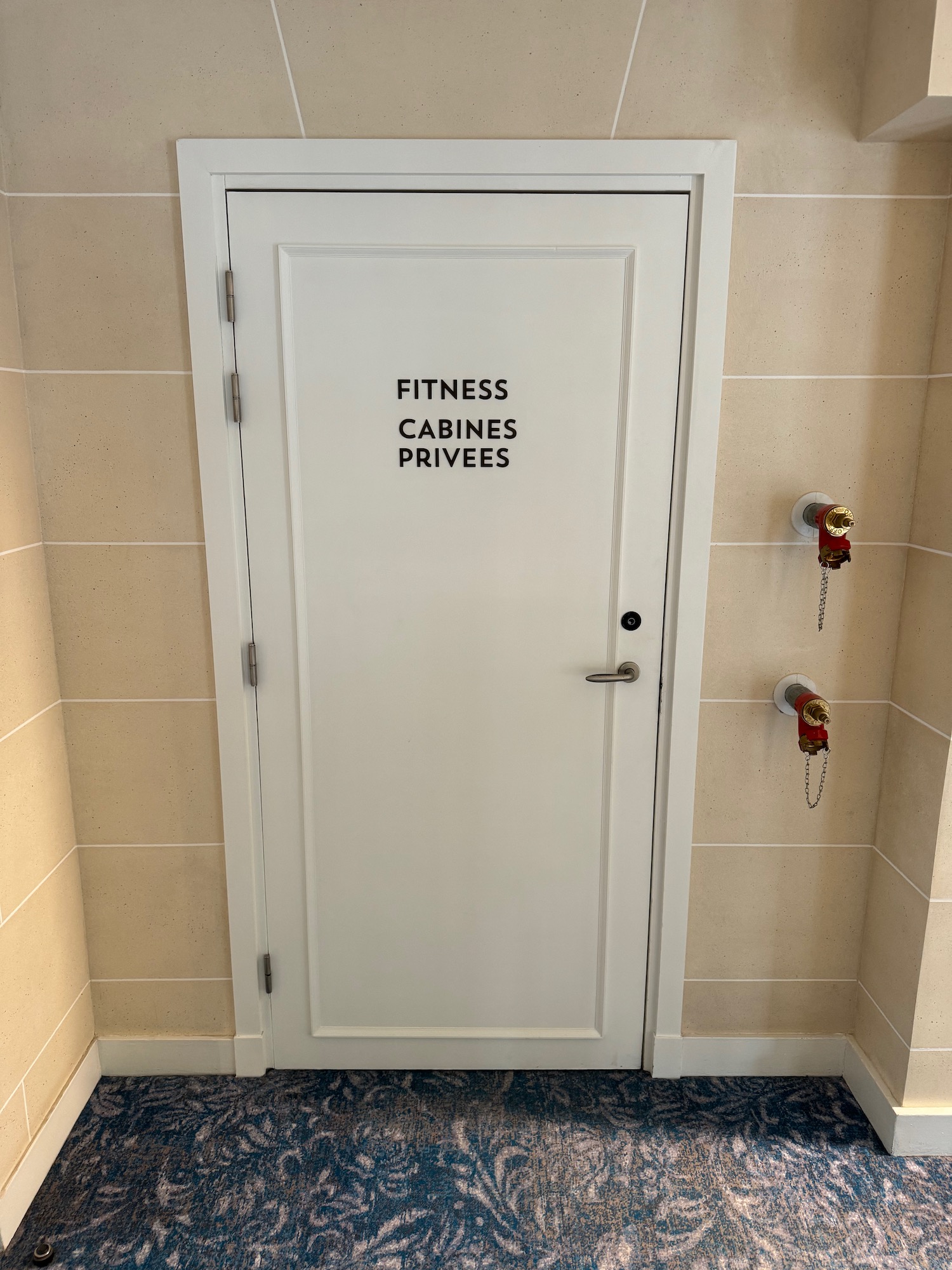 a white door with black text on it