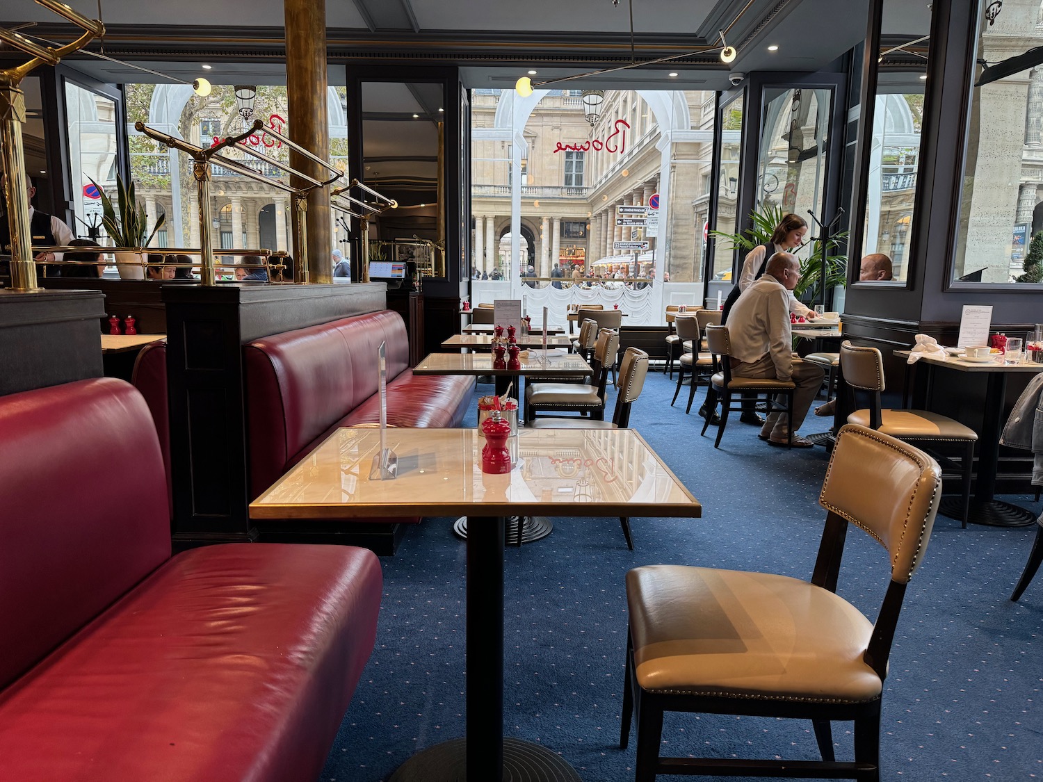 a restaurant with tables and chairs