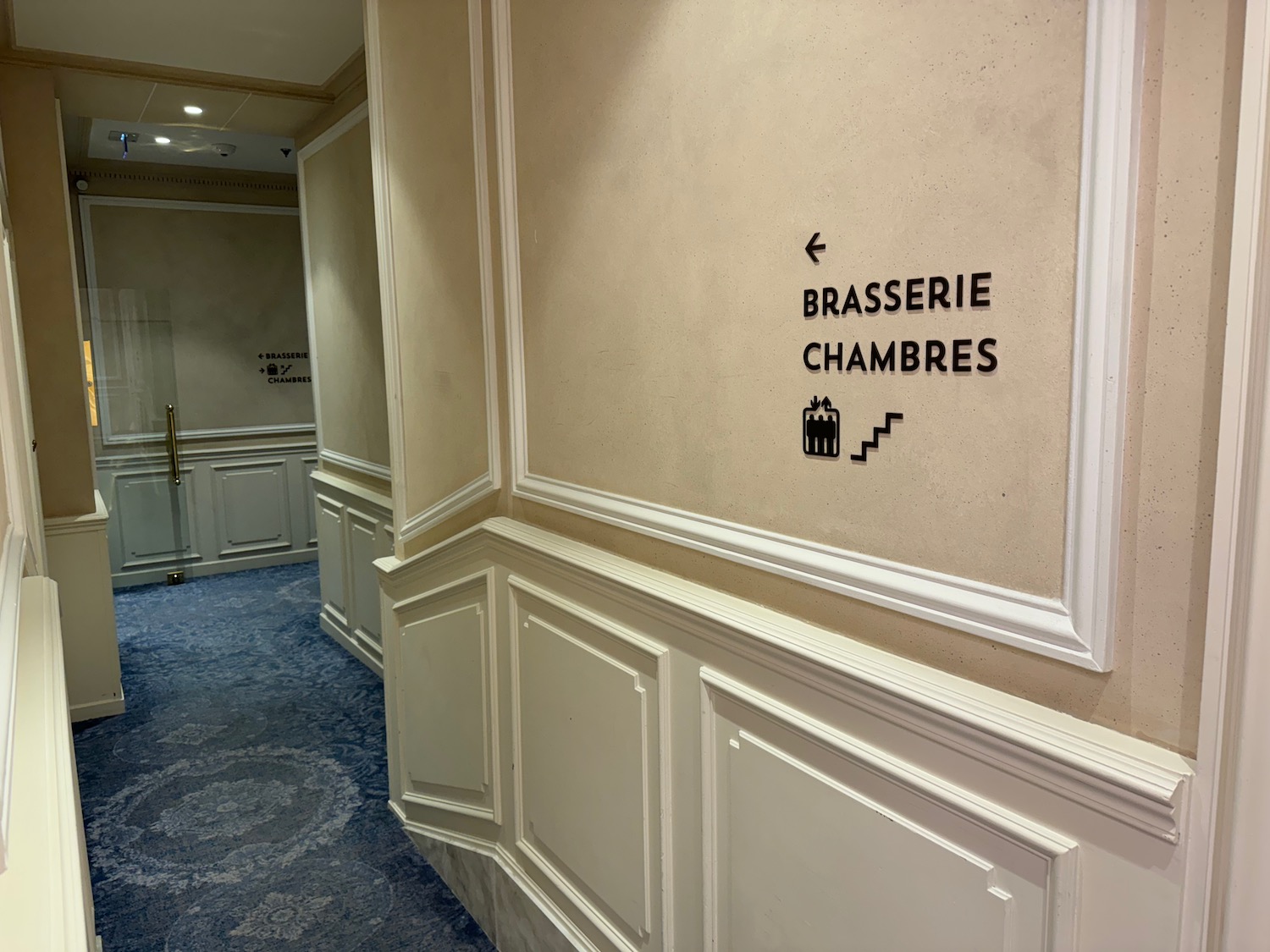 a wall with white trim and black text on it