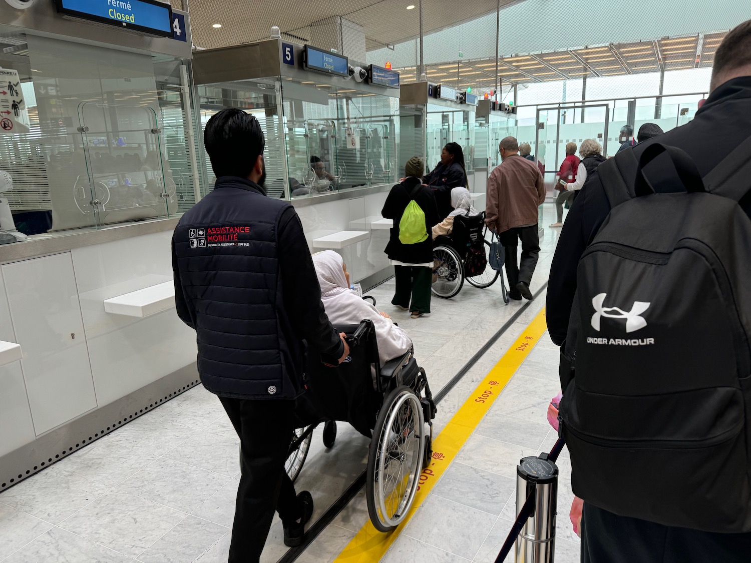 people in a room with a wheelchair