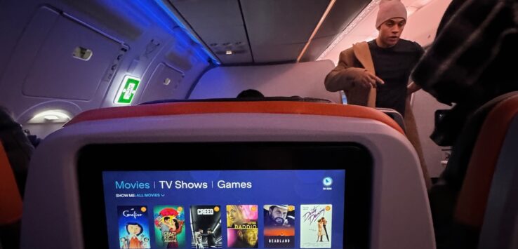 a screen on the back of an airplane