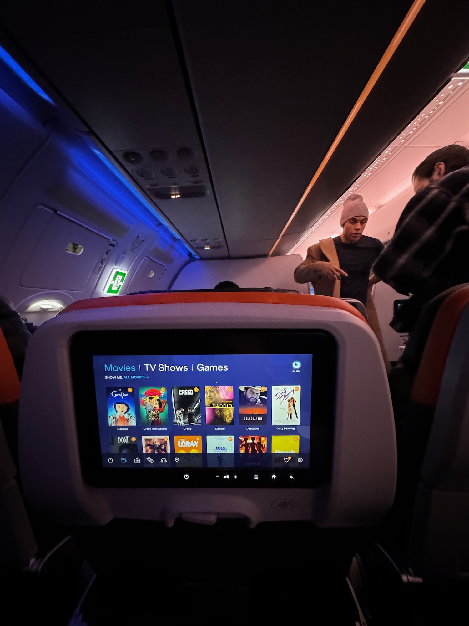 a screen on the back of an airplane