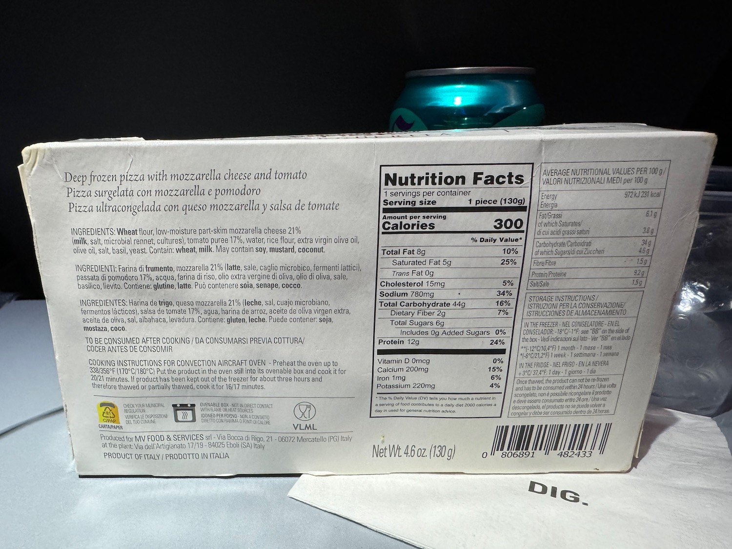 a white box with black text and a blue can