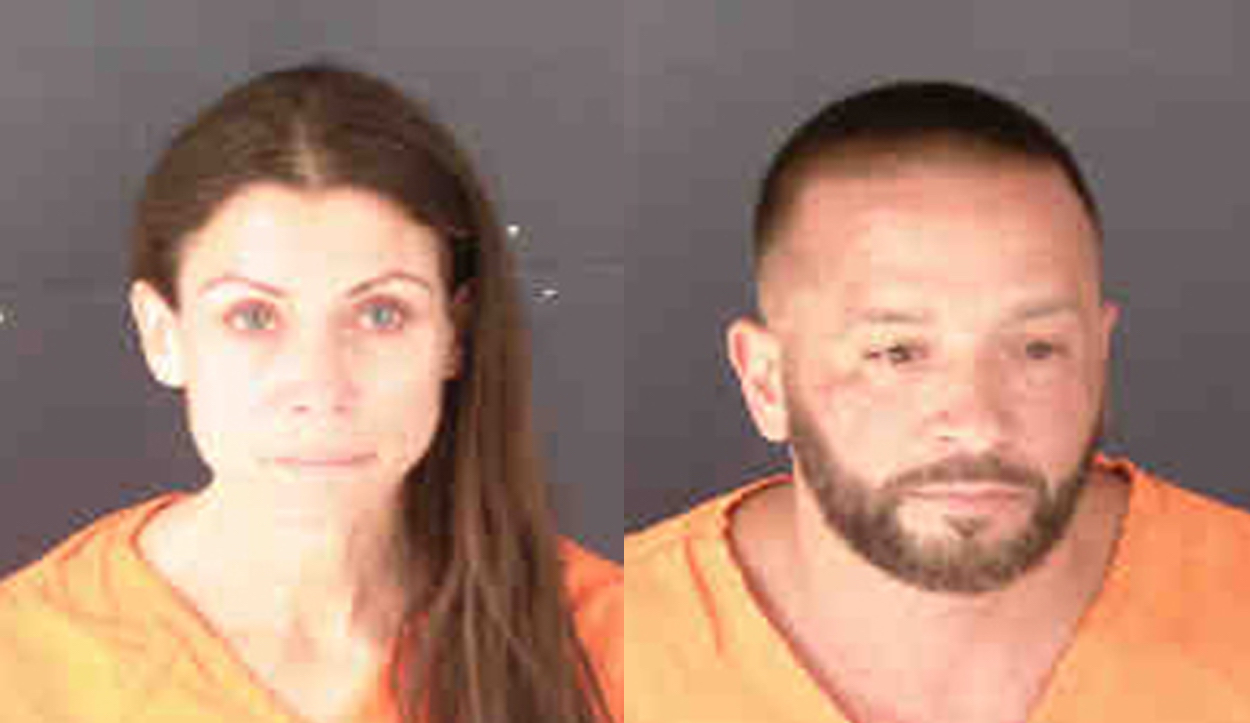 a man and woman posing for a photo