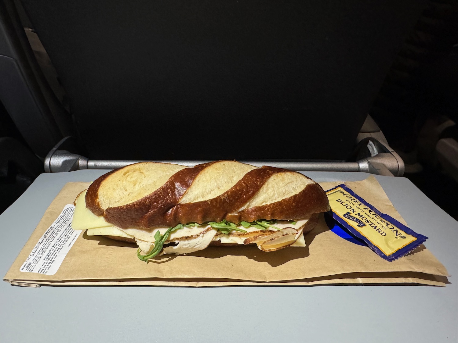 a sandwich on a paper bag