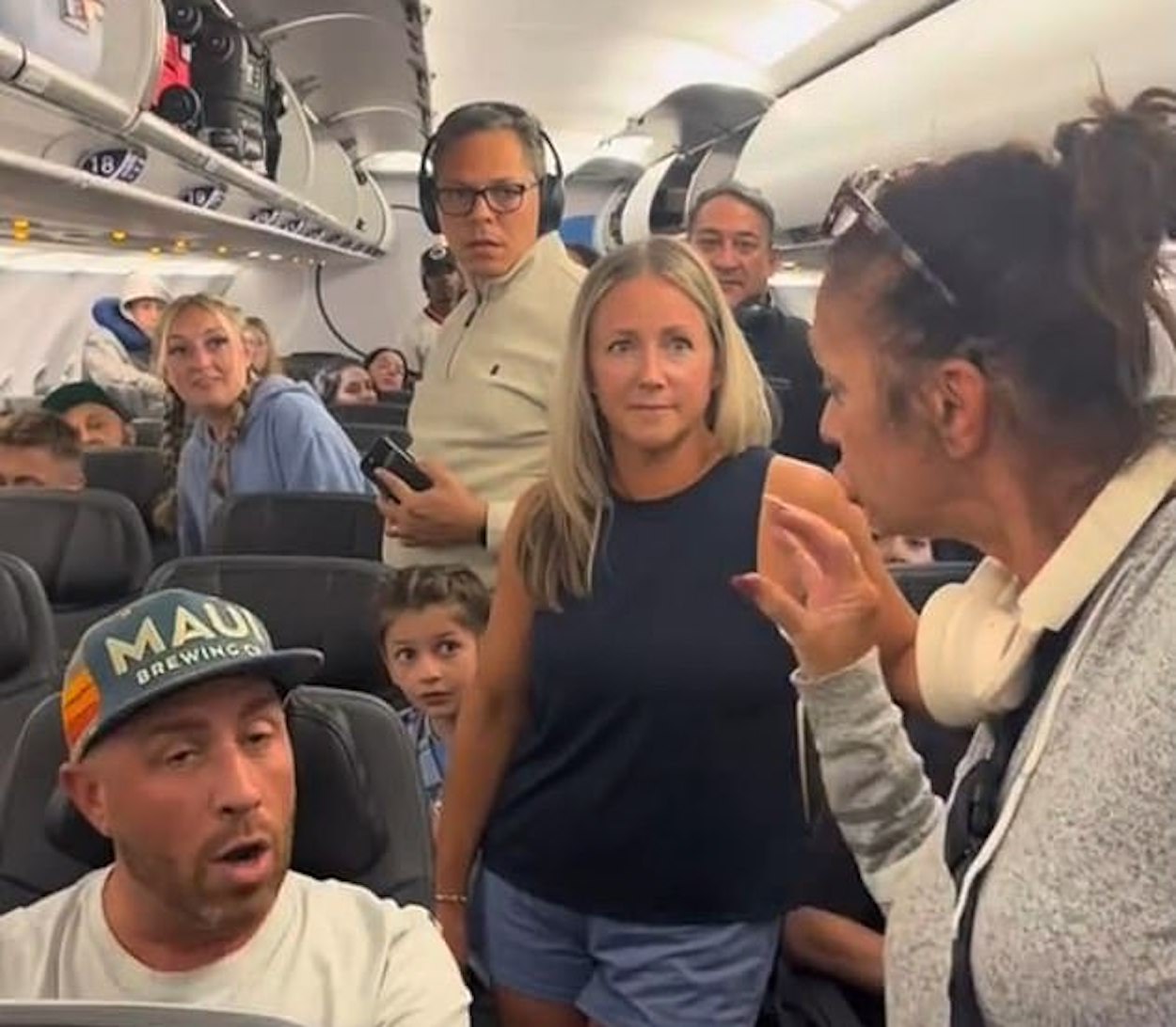 a group of people in an airplane