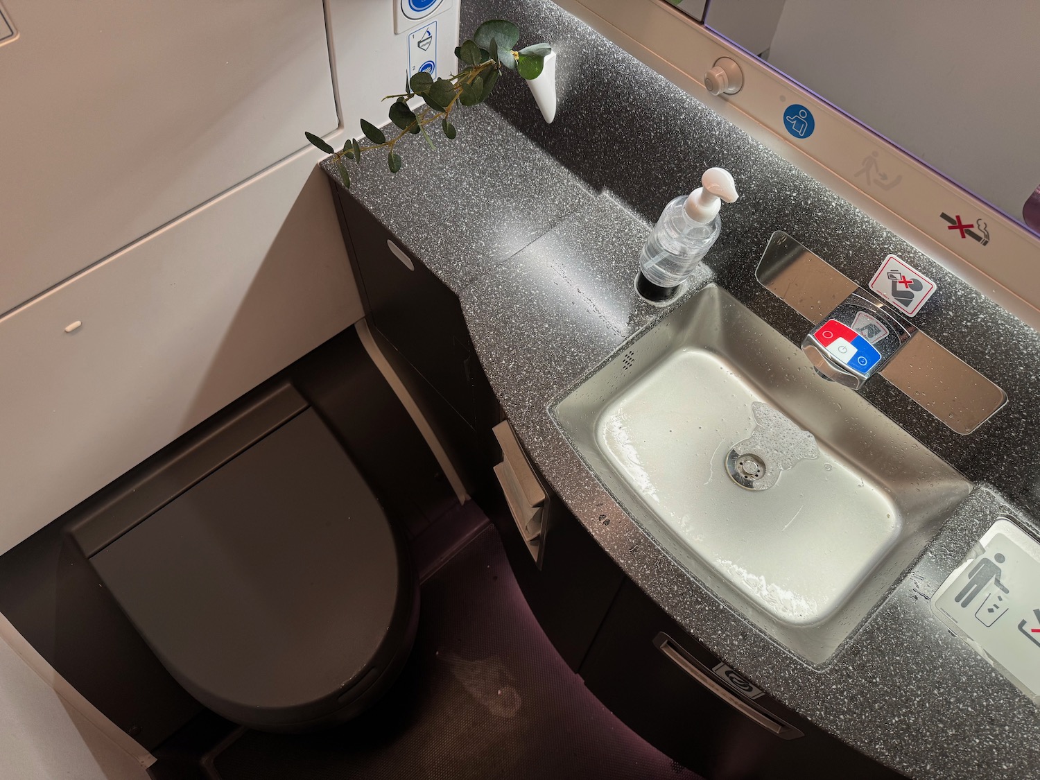 a sink and toilet in a bathroom