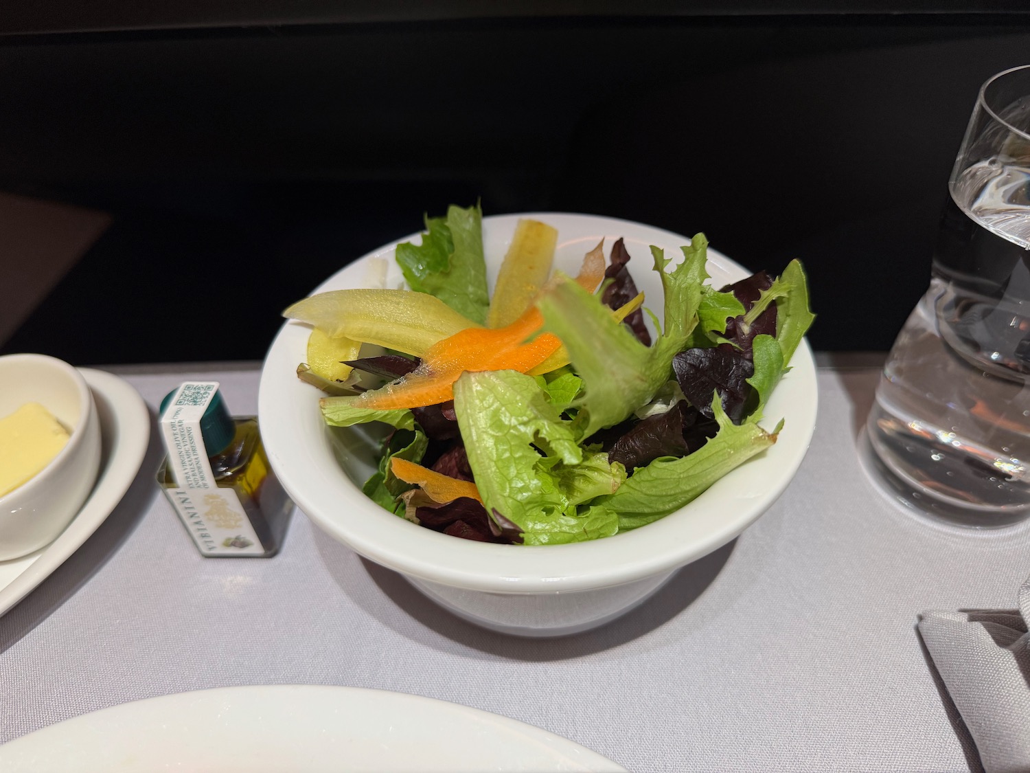 a bowl of salad on a table