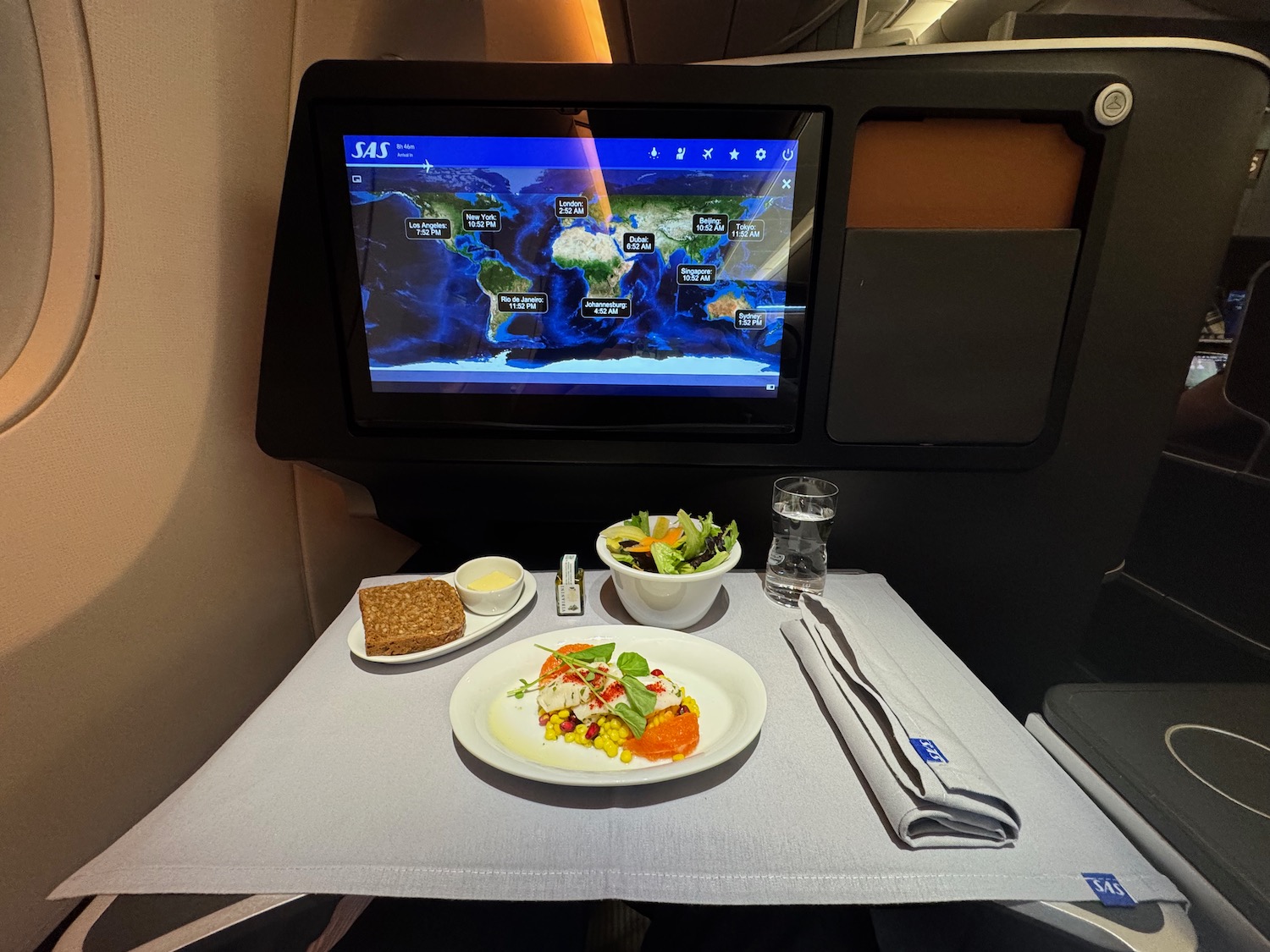 a table with a television and food on it