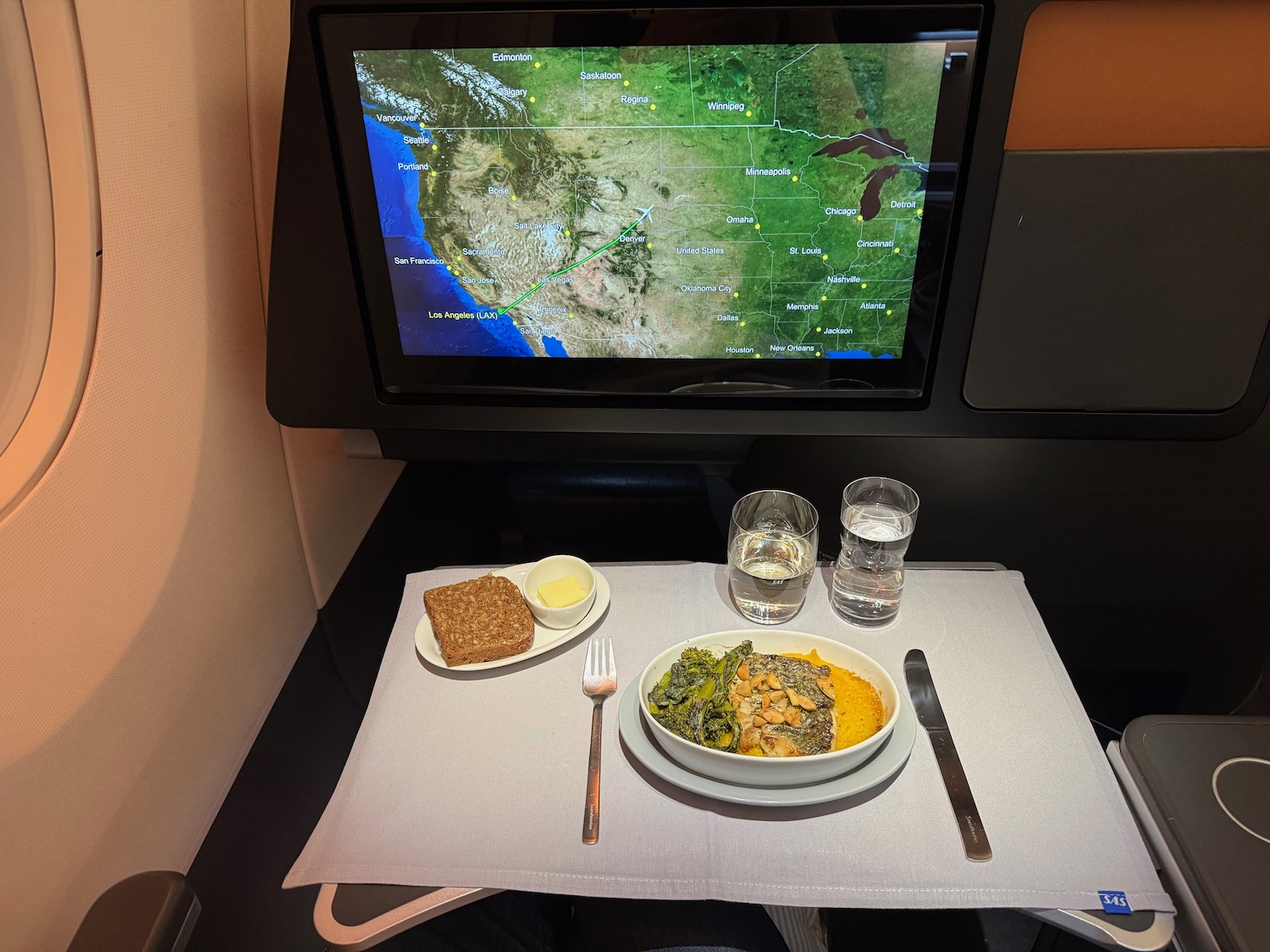 a table with food and a television on it