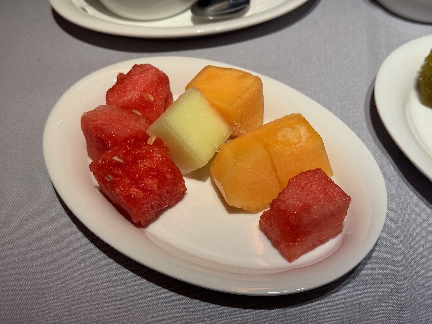 a plate of fruit on a table