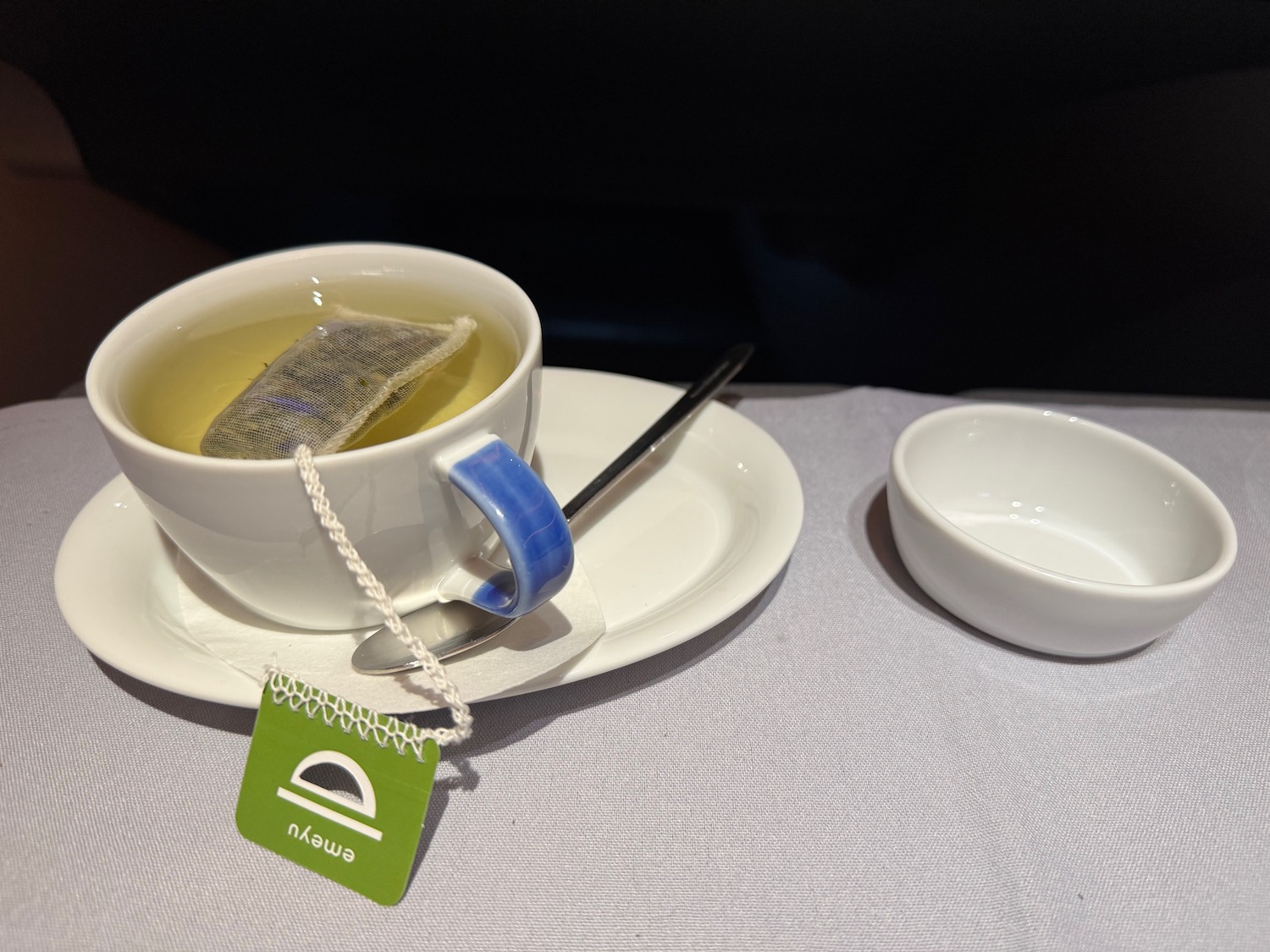 a cup of tea with a tea bag in it
