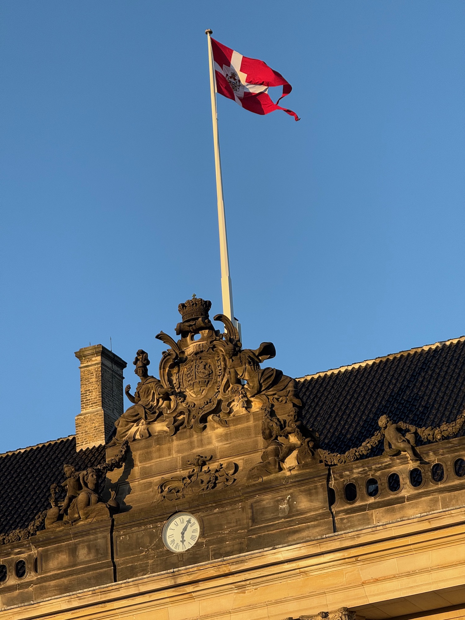a flag on a flagpole on top of Marine Corps War Memorial