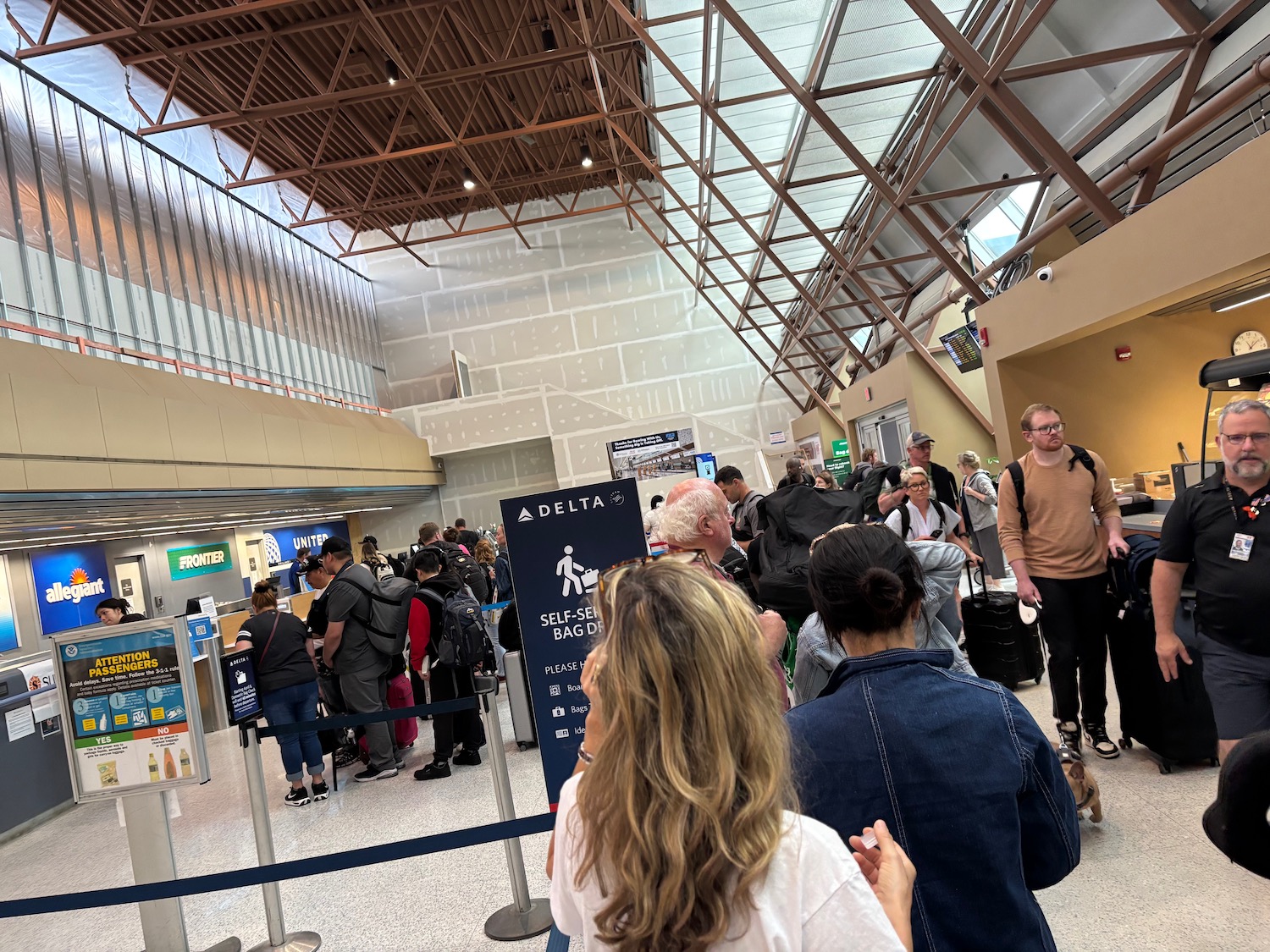 a group of people in an airport