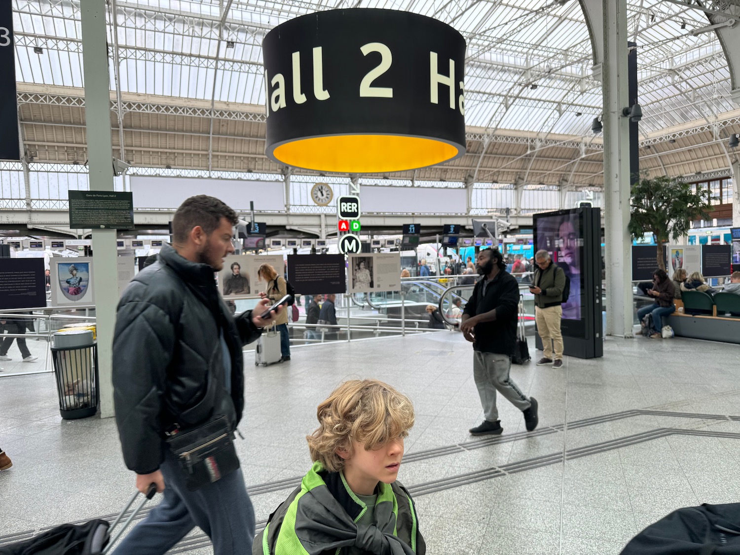 a group of people in a train station