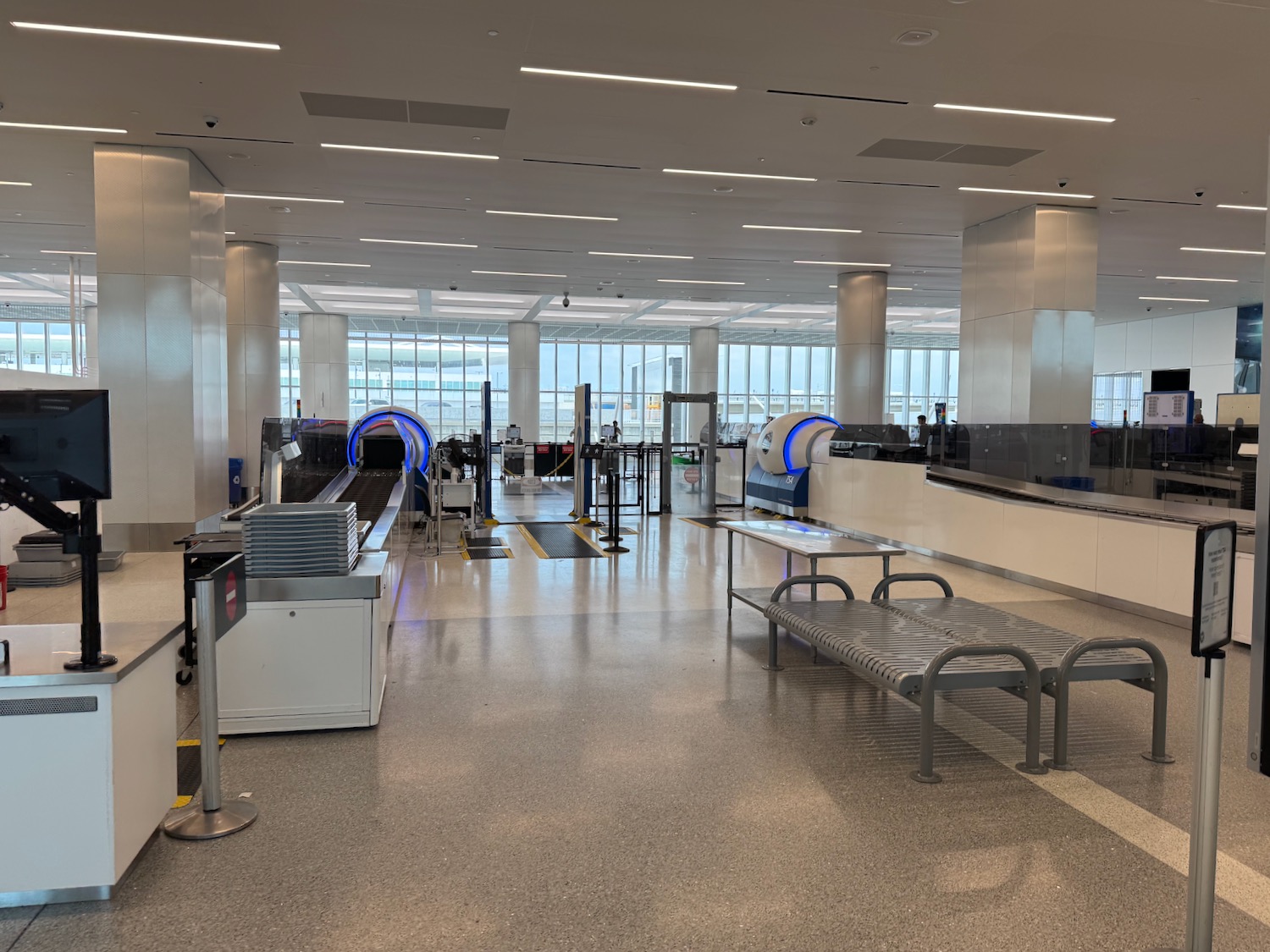 an airport terminal with a lot of equipment