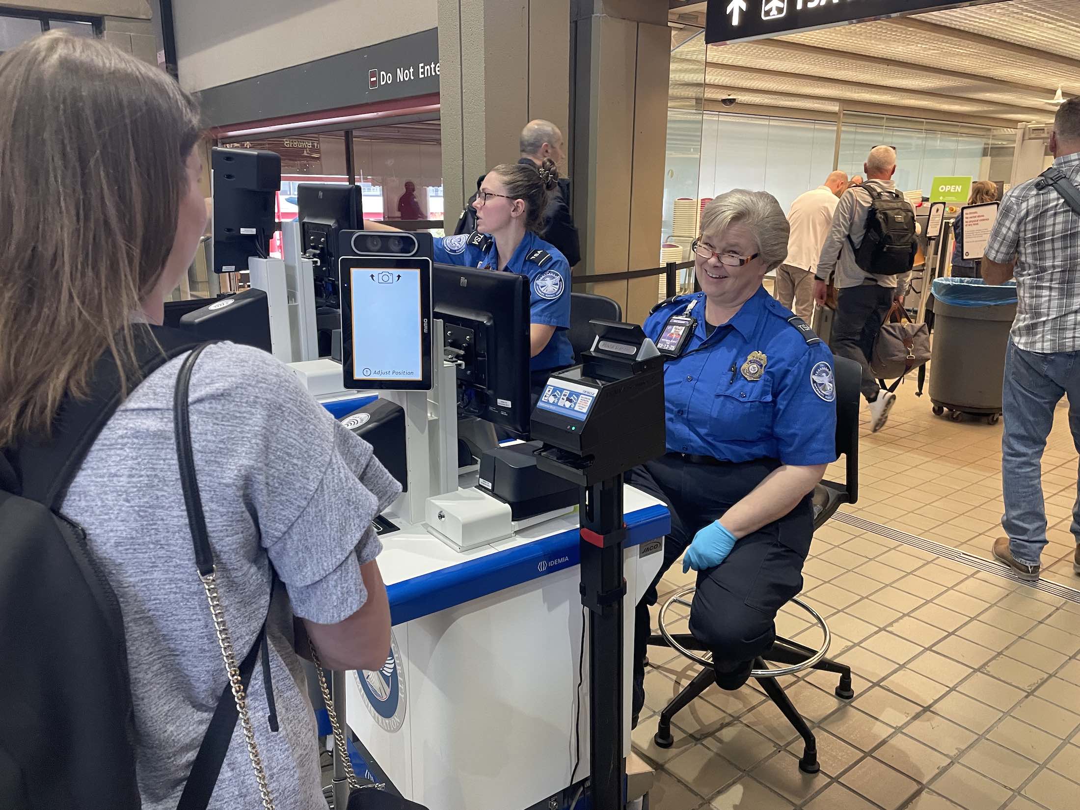 a group of people in a terminal