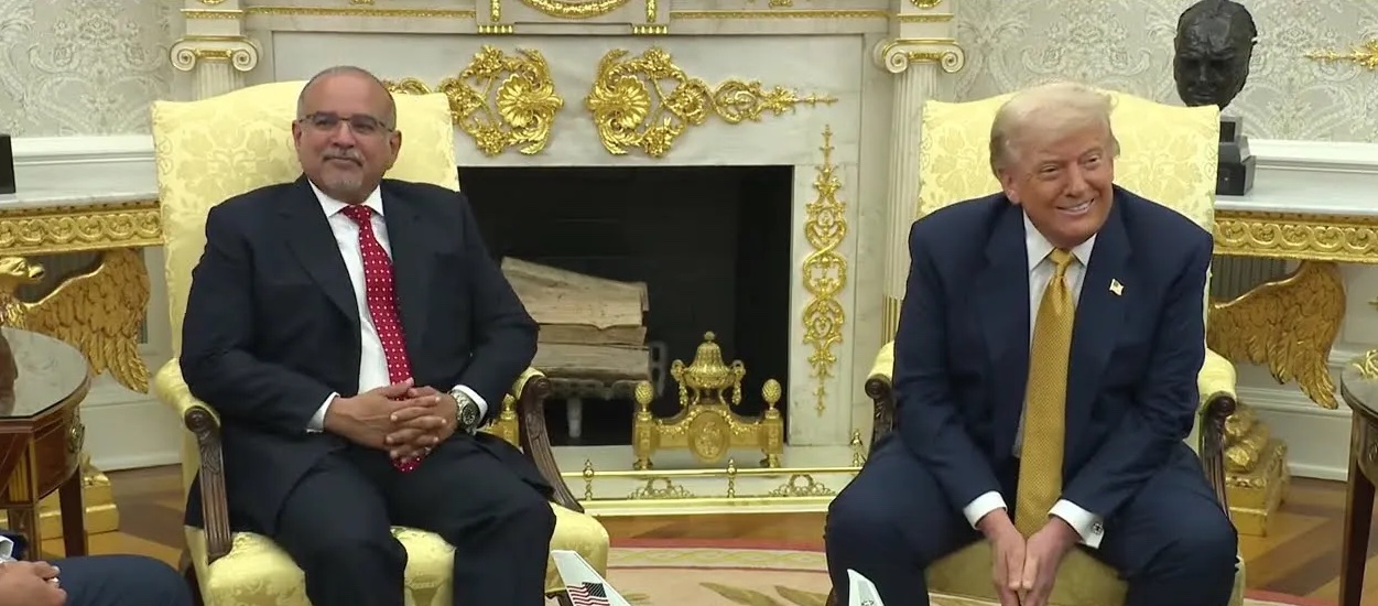 two men sitting in chairs