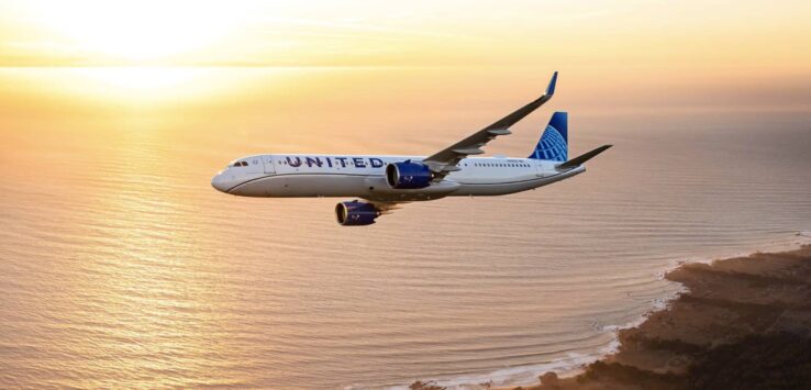 a plane flying over water
