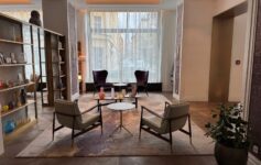 a room with chairs and a table