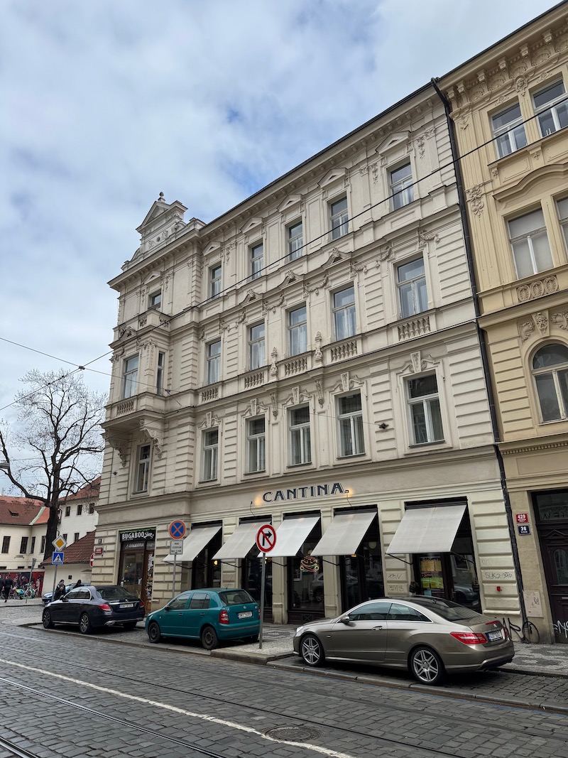 a building with cars parked on the side of it