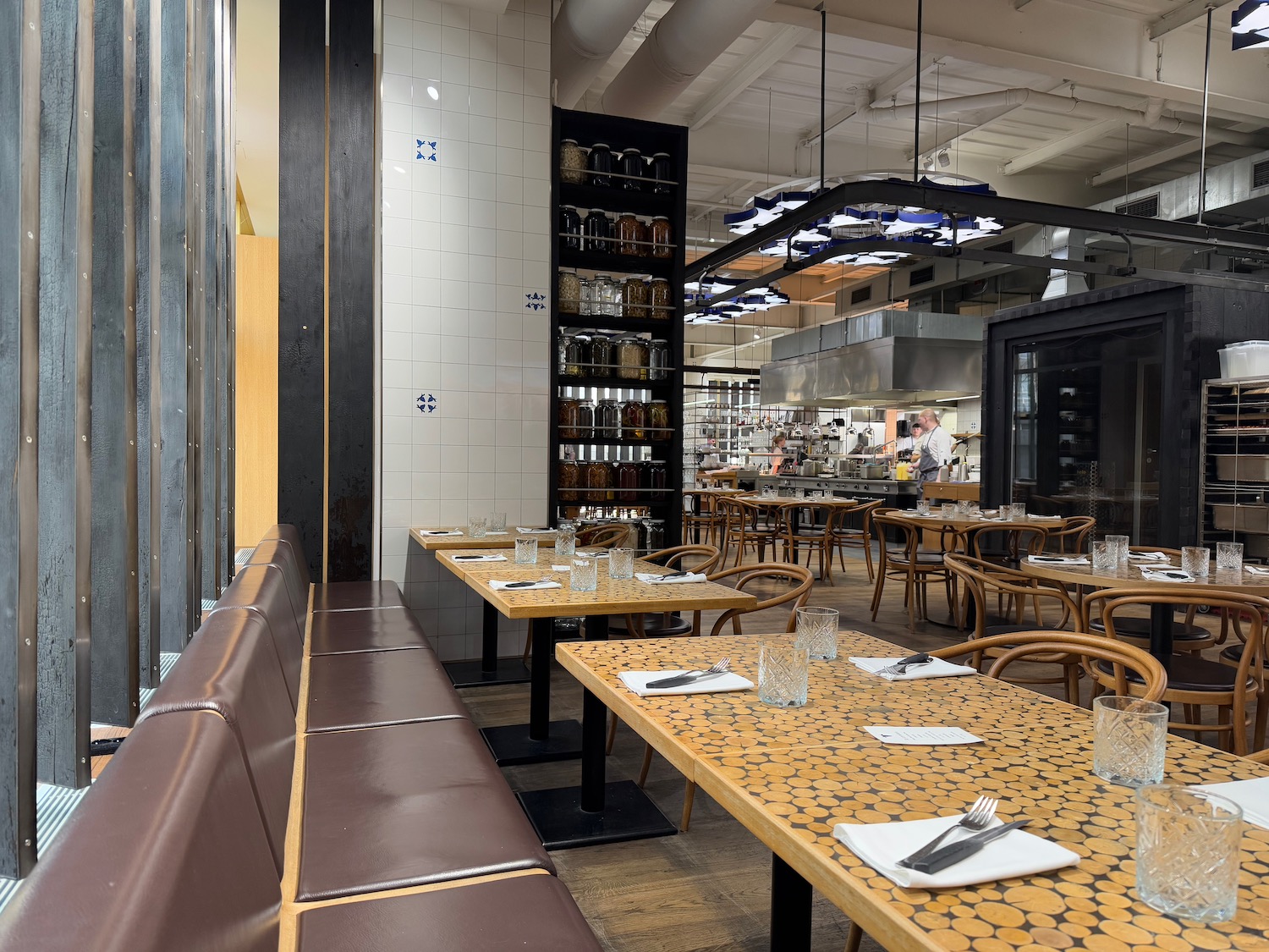 a restaurant with tables and chairs