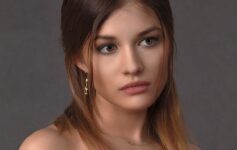a woman looking at the camera