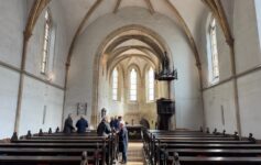 a group of people inside a church