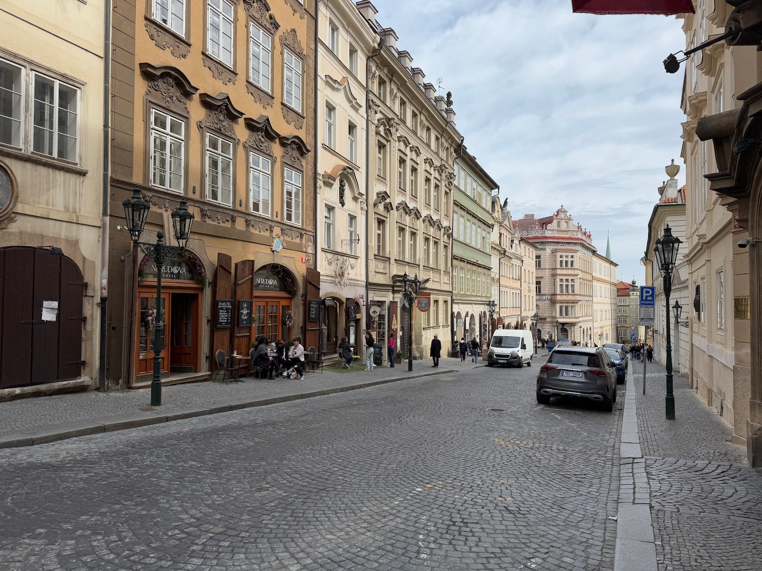 a street with buildings and cars