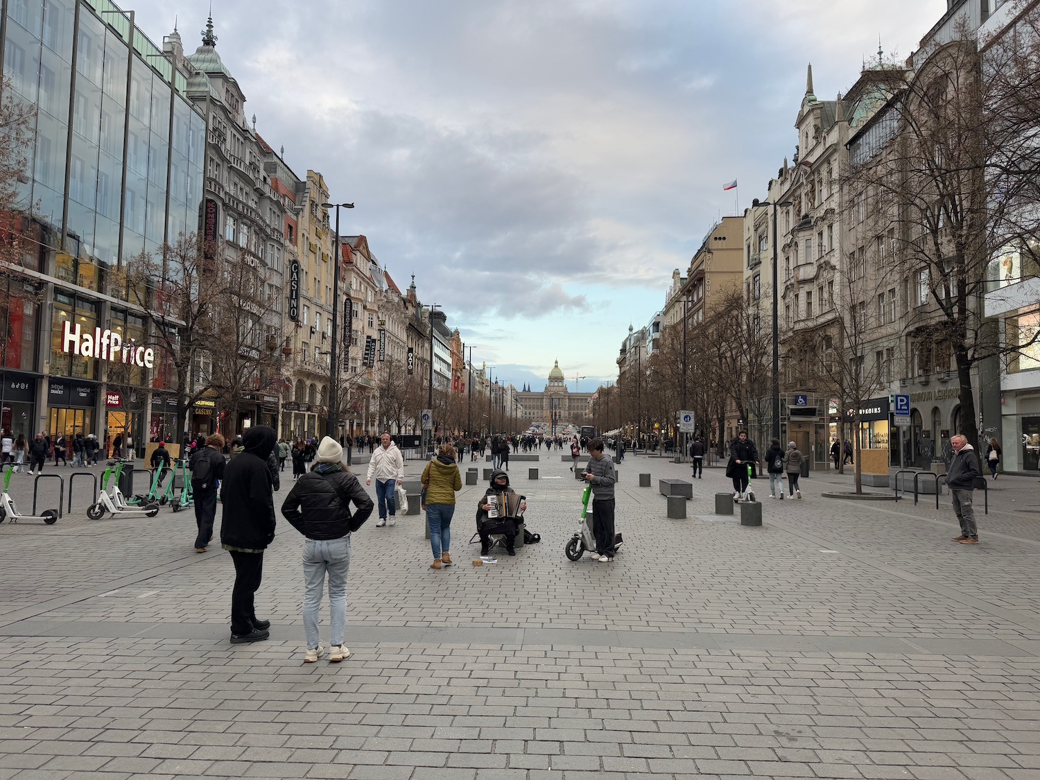 a group of people walking on a street