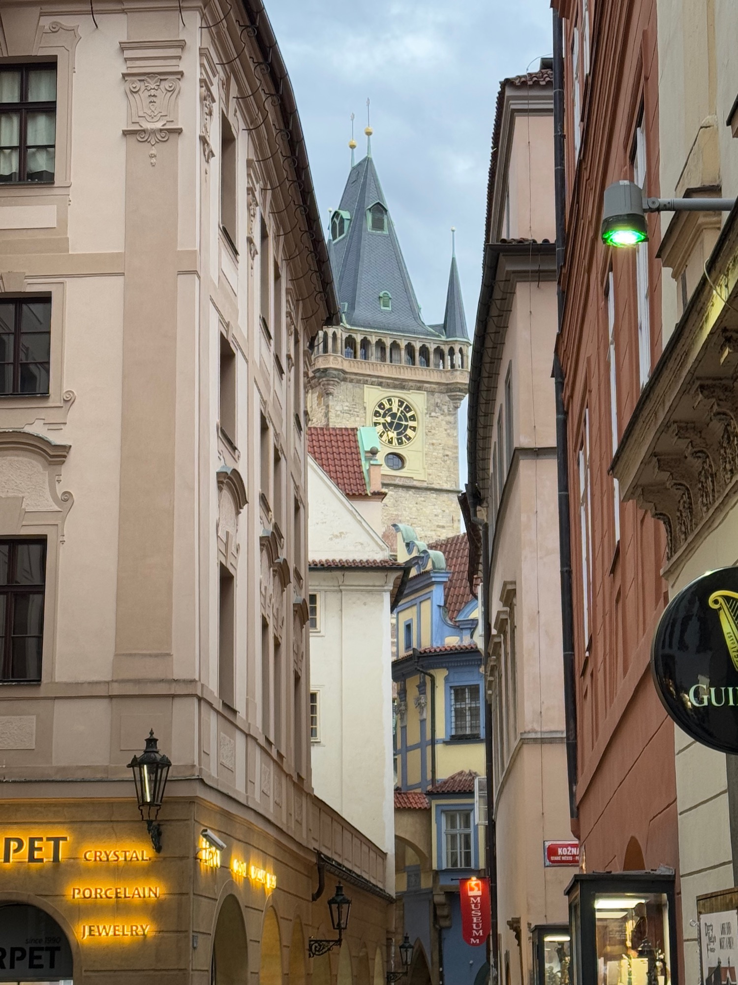 a street with buildings and a clock tower