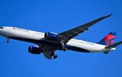 a plane flying in the sky