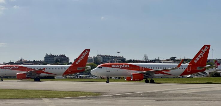 EasyJet Airbus A320s on the tarmac in Lisbon, Portugal.