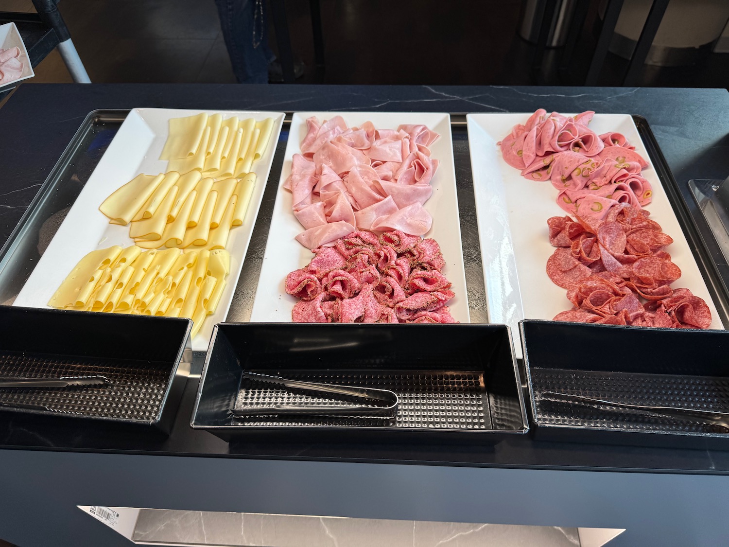 a tray of different types of meat