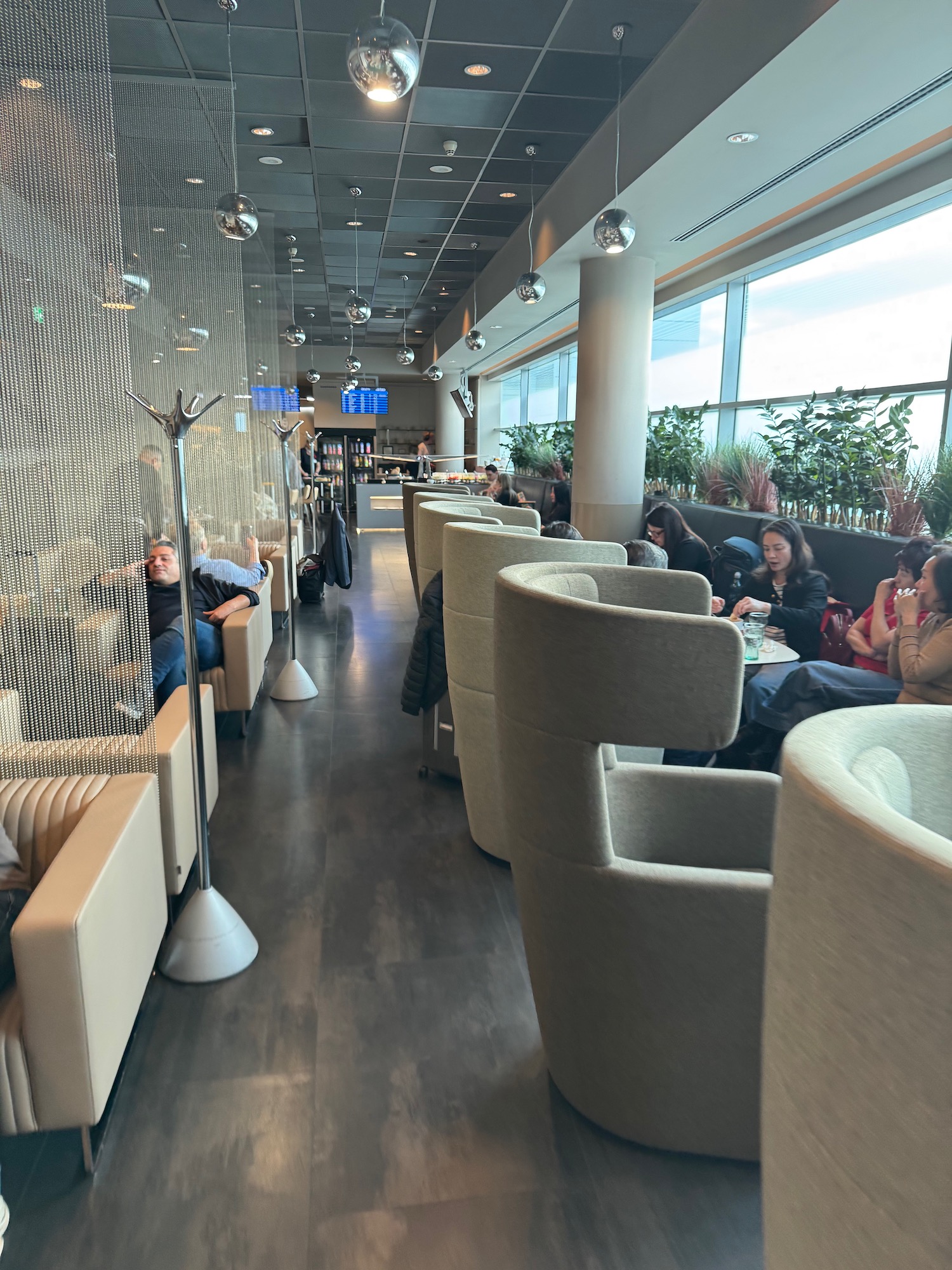 a group of people sitting in a restaurant